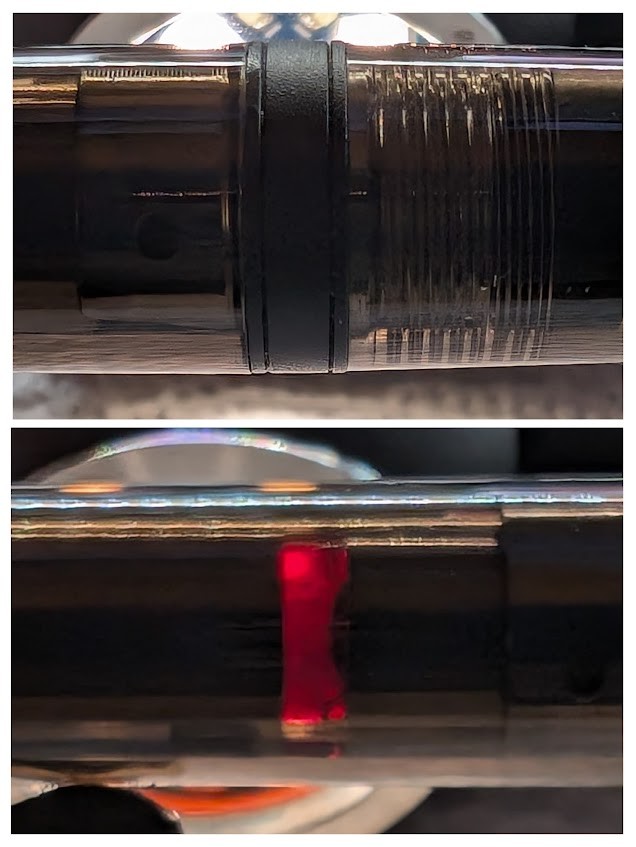 Two photo collage of a Jinhao 20 fountain pen with a transparent black body. In the top photo, the only parts visible are the seam between halves of the body and some threads and parts of the nib unit. The bottom photo shows a little bit of the ink at the tail end of the converter just past the nib unit, but clearly visible through the body with backlight.