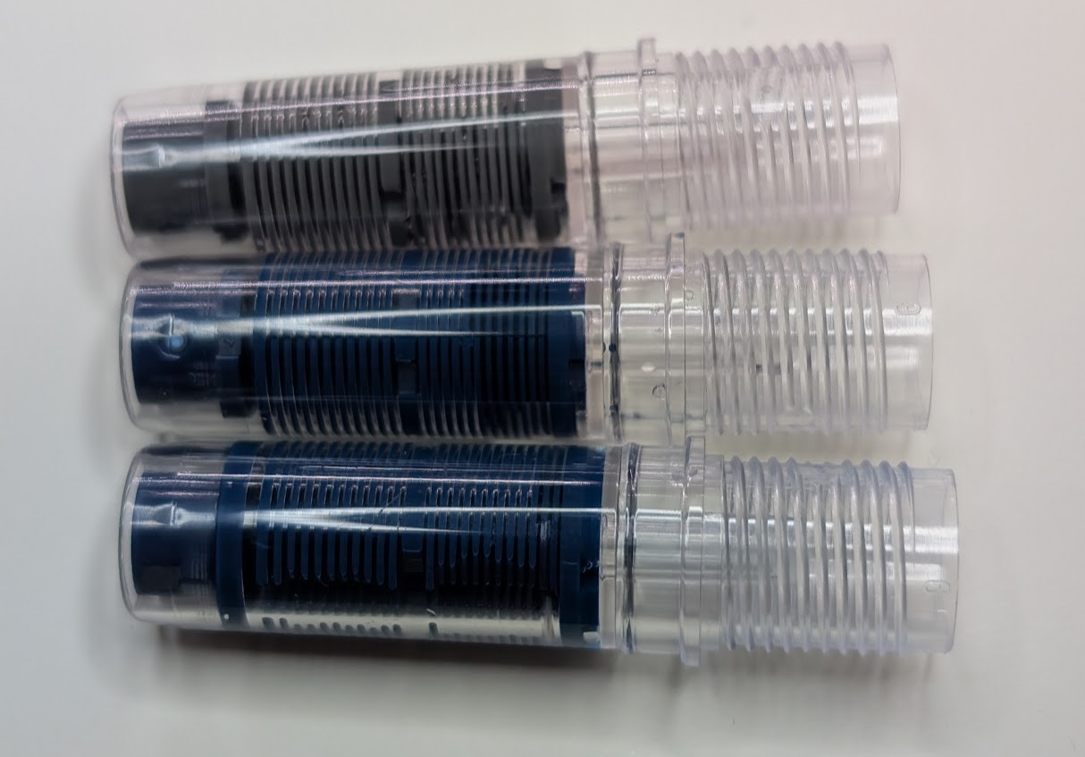 Photo of three fountain pen sections and feeds from Platinum fountain pens. Two from Preppy pens and one from a Plaisir.