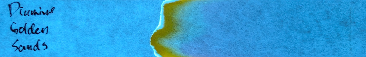 Photo of chromatography paper under UV light.