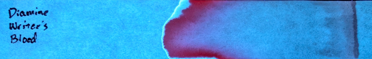 Photo of chromatography paper under UV light.