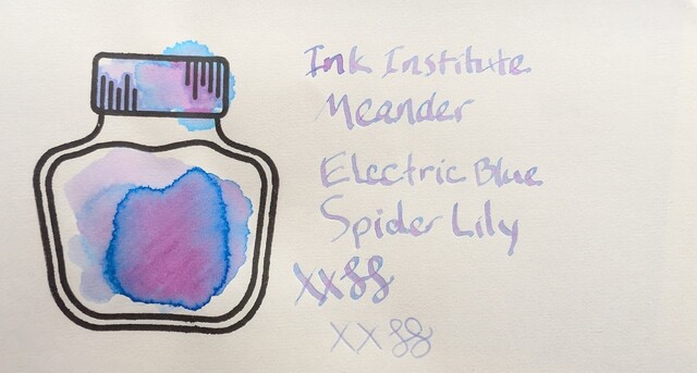 Photo of an ink swatch on Midori MD paper. The ink is a chromashader and changes from blue to purple to pink in various areas of the swatch. The text is also chromashading but is a bit light. It reads "Ink Institute Meander / Electric Blue Spider Lily" followed by XX and curlicues in stub and EF nib writing.
