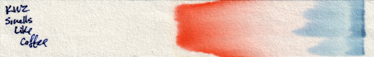 Photo of a chromatography strip with ink. On the right is a faint line where it started which appears bluish. There are some blue areas as it expanded to the left, which eventually turns more tan. More to the left it starts to look more orange than tan.