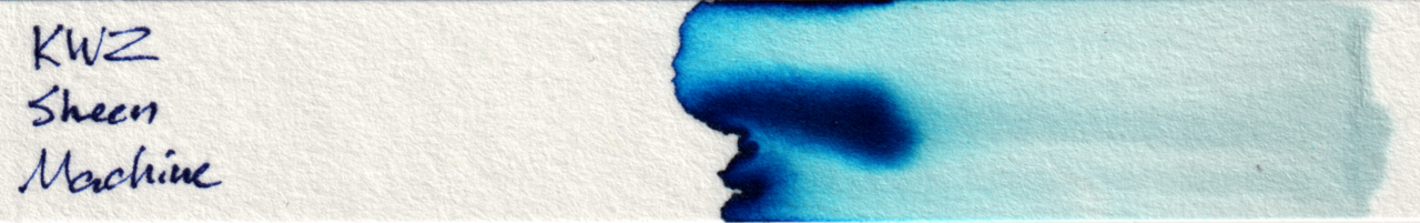 Photo of a chromatography strip. Starting at the right it has a faint blue line and a large area of light blue with some stripes of slightly darker blue. At the left is a dark blue area that fades into lighter blue in places. The far left edge is dark blue.